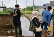 Camat Alex Kawal Usulan Talud untuk Atasi Genangan Air